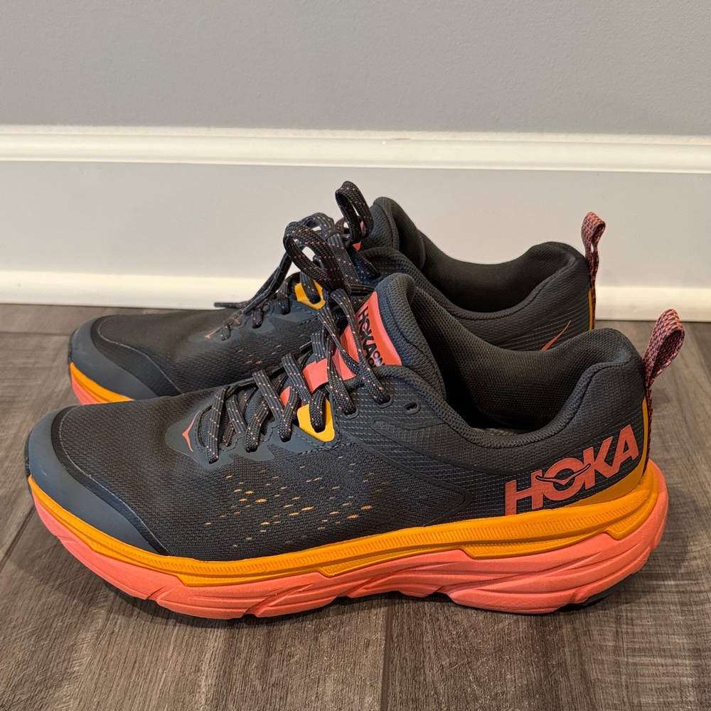 Hoka Black and Orange Athletic Shoes